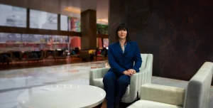 Brandy Baxter-Thompson sitting in a chair posing for an image